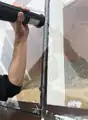 Calking the front glass