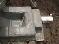 Bricks are covered and sealed in concrete.