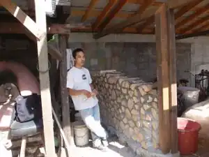 CCAT greenshed north wall Cordwood and mortar wall of CCAT's Greenshed