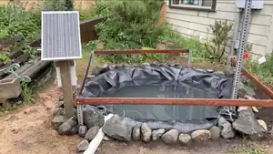 CCAT Small Pond Revitalization A small pond with a solar aerator at CCAT