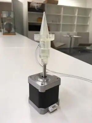 Extrusion head with an integrated screw and UV-diodes attachments, savings €13.05 per part and improved functionality