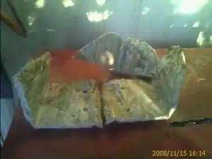 Pressed Plastic A process to thermoform waste plastic bags to form molds for nut shellers using resources available in Haiti