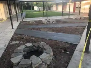 triangle of rebirth Benches that meet the students seating needs in an outdoor classroom environment.