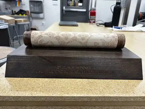 Final iteration of the Scroll graduate trophy for the Humanities and Letters category.