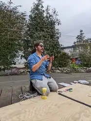 Jordy deliberates over the Newton's Cradle in hand