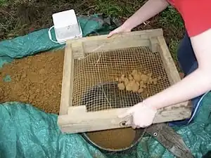 Large clay chunks being screened out