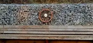 pirate's cove corner A pirate themed agricultural area replete with gabions, rope, and a ship wheel.