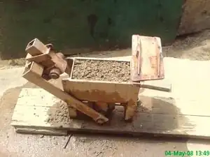 Compressed earth brick press An exploration of compressed earth bricks