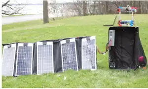 Mobile Open-Source Solar-Powered 3-D Printers for Distributed Manufacturing in Off-Grid Communities