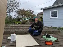 Sasha looks up from outlining the Peg Maze