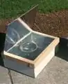 Solar Box Cooker: Glass panel creates greenhouse effect. Example project: Solar box cooker research project