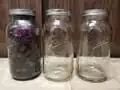 The first jar is almost full.
