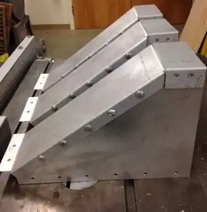 Gutter Repair An innovative solution for gutter waterfalls in the Zane Middle School quad.